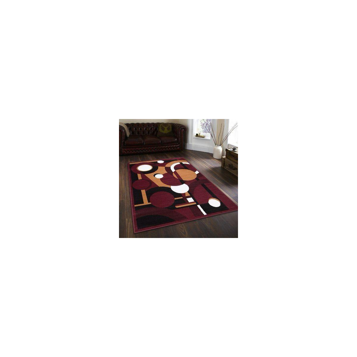 Burgundy circles and geometric rug in living room
