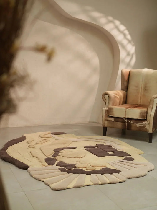 Beige and brown abstract face hand tufted rug