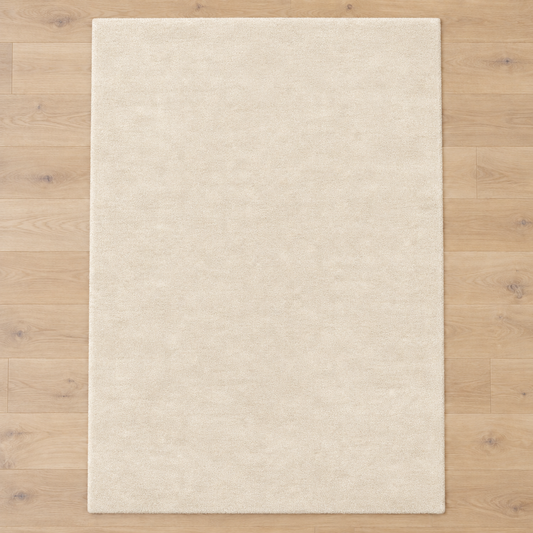 Totally plain ivory cream hand tufted rug, no border