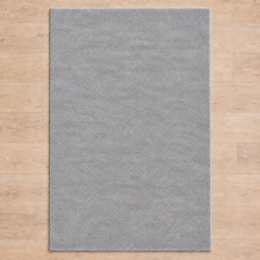 Totally plain light grey hand tufted rug, no border