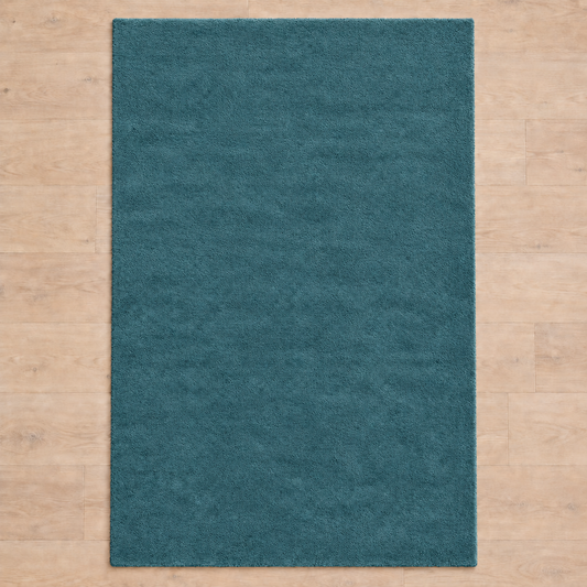 Totally plain muted teal hand tufted rug, no border