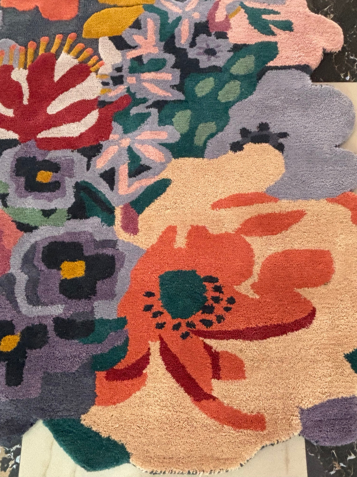 Actual floral rug pile and edge detail