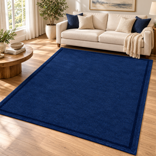 Navy Blue Plain Hand Tufted Rug – Subtle Single Border styled in a decorated living room with sofa