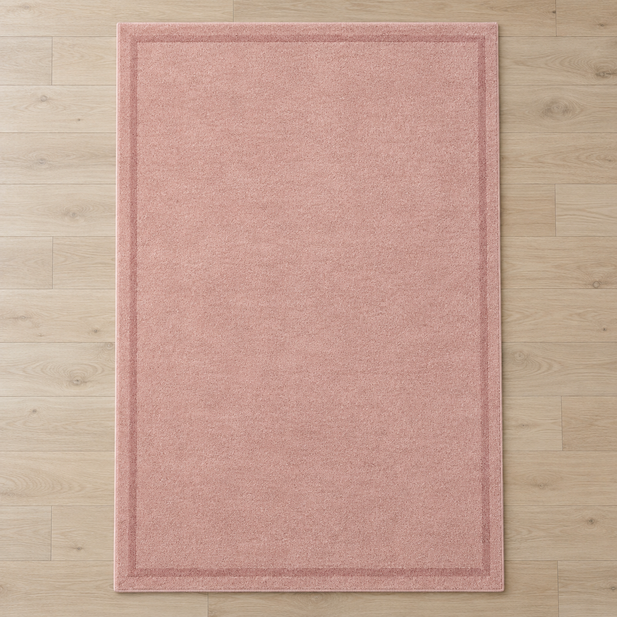 Blush Pink plain hand tufted single border rug