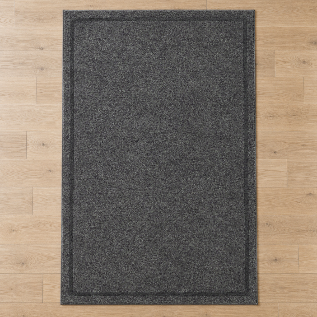 Charcoal Grey plain hand tufted single border rug
