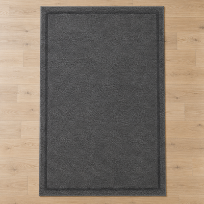 Charcoal Grey plain hand tufted single border rug