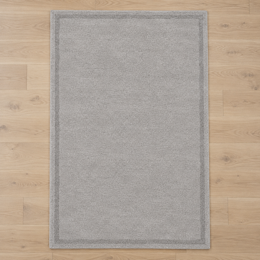 Light Grey plain hand tufted single border rug