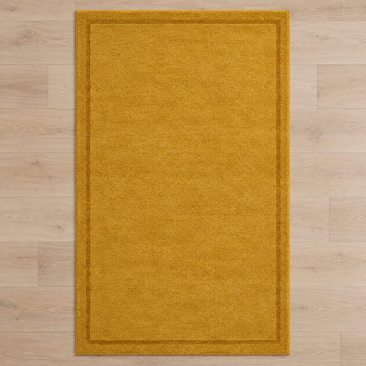 Mustard plain hand tufted single border rug