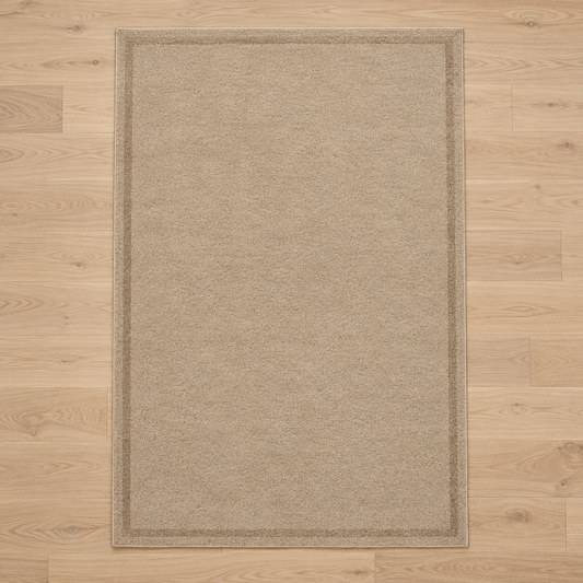 Sand plain hand tufted single border rug