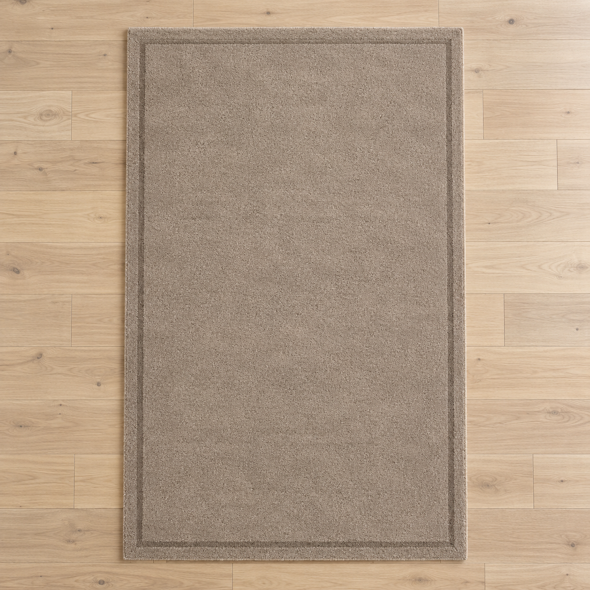 Taupe plain hand tufted single border rug
