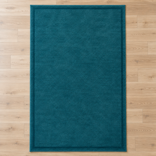 Teal plain hand tufted single border rug